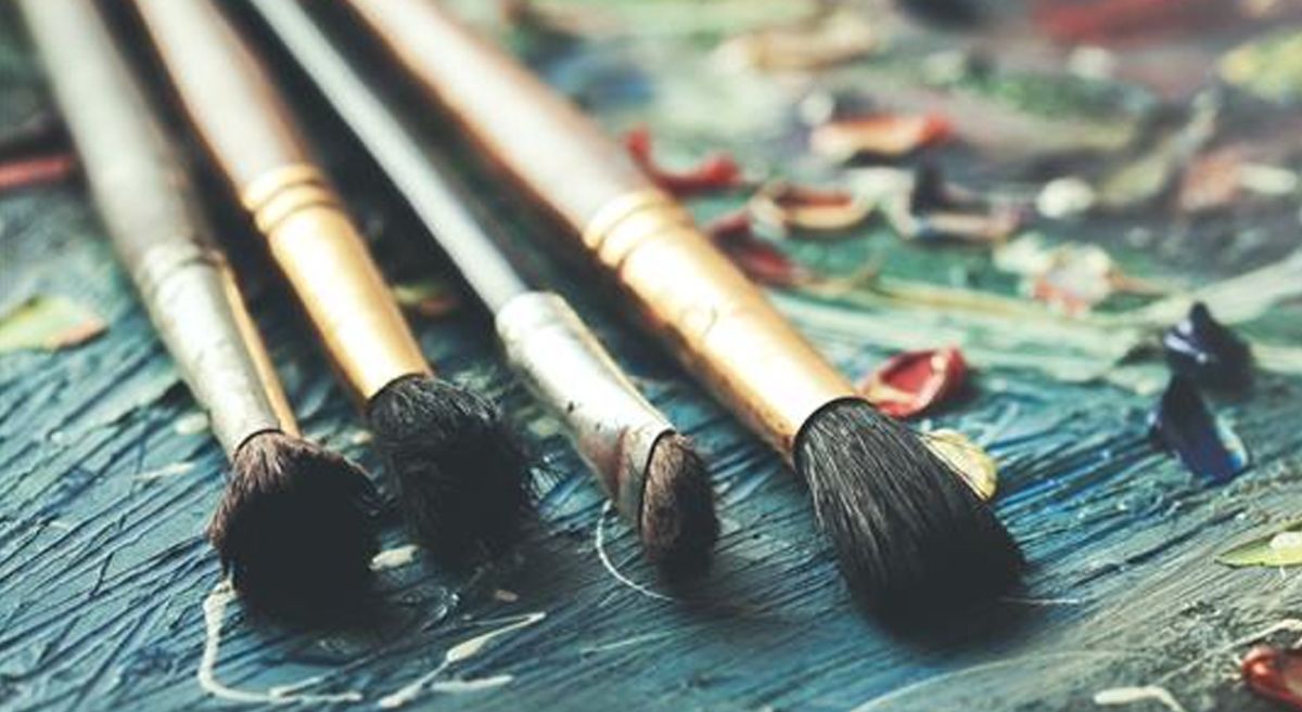 Picture of paint brushes on a canvas